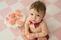 infant eating cookies 