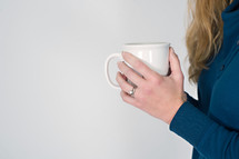 woman holding a mug of coffee