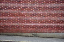brick wall and sidewalk background 