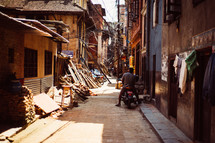 earthquake damage through an alley in Nepal 