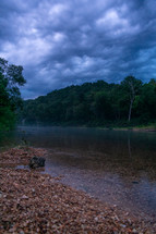storm clouds over a river