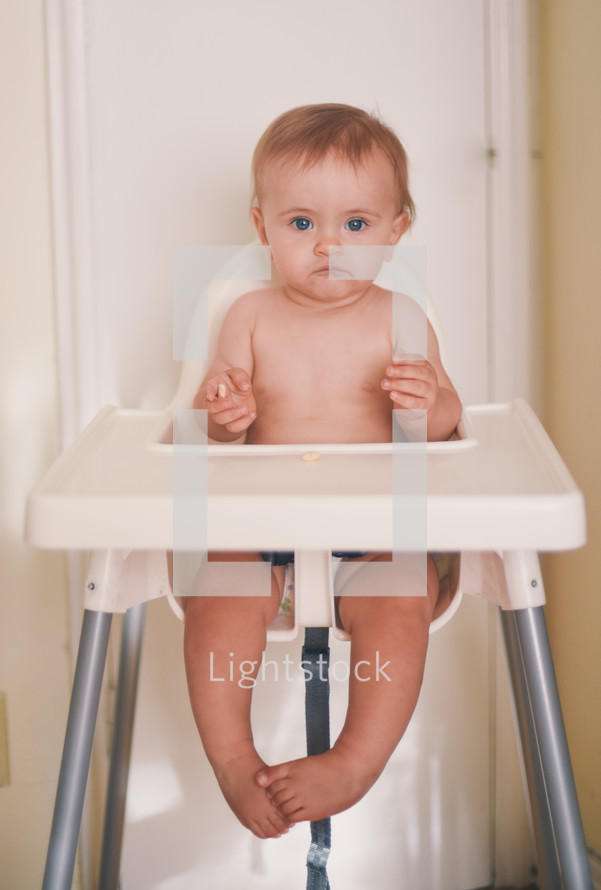 infant in a highchair 