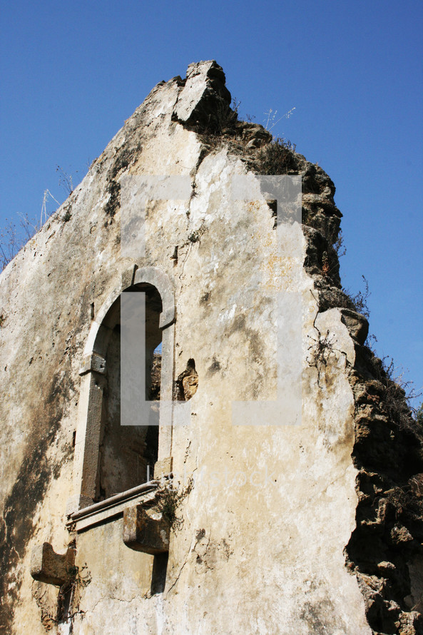 window in a wall in ruins 
