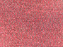 red fabric texture useful as a background