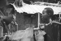 woman in a village in Rwanda 