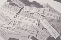 Scripture cards laying on a table in black & white.  Bible verses up close covering perseverance, the truth and God's faithfulness from Galatians, John, Lamentations, Isaiah and more.