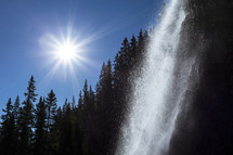 a sunburst and a waterfall 