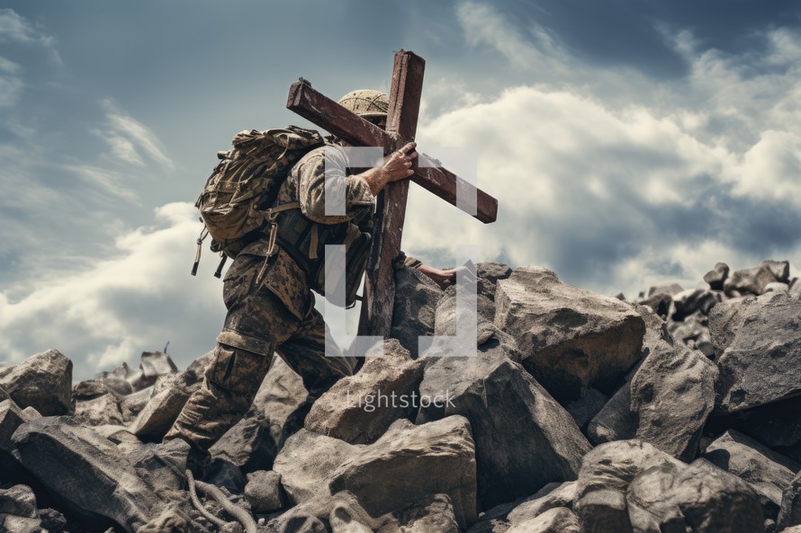 Soldier carrying a cross on top of mountain