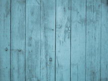 Texture of light blue painted wooden surface
