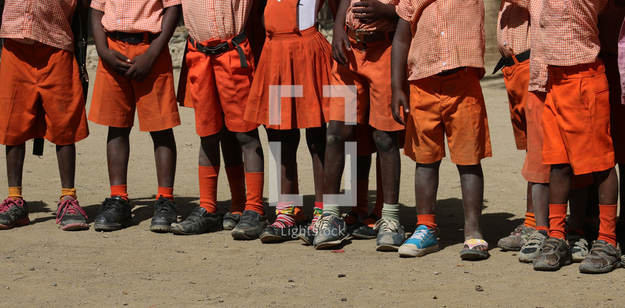 feet of school children in Haiti 
