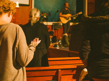 song and prayer during a worship service 