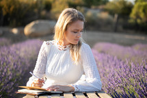 a woman in a field of lavender journalism 