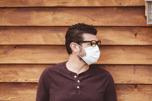 a man wearing a surgical mask 