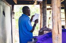 a man reading scripture in Honduras 