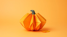 Origami pumpkin made of paper. 
