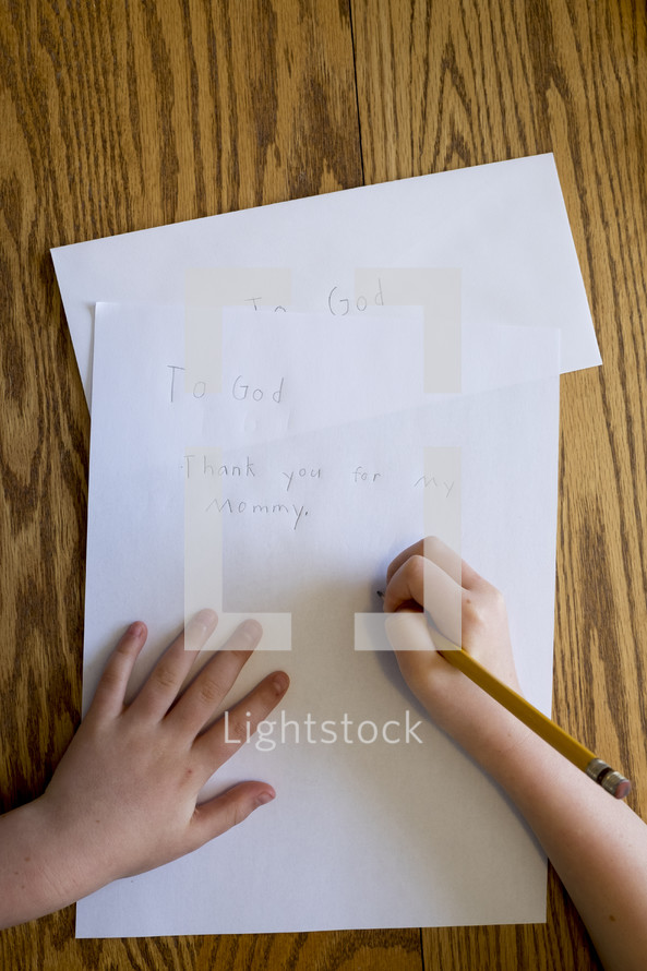 a child writing a thank you note to God 