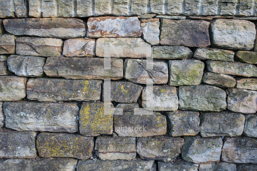 stacked stone wall background 