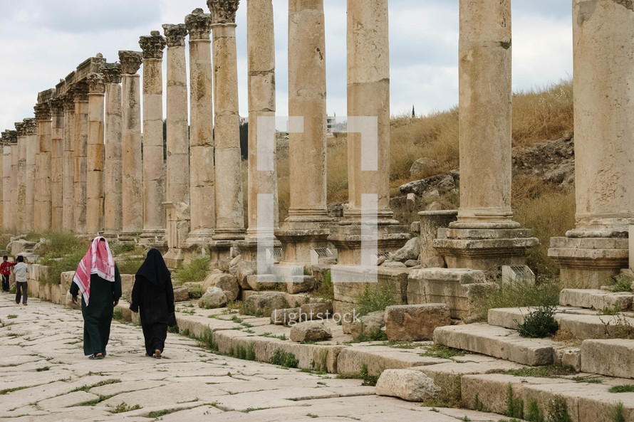 tourist visiting ancient ruins 
