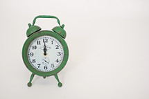 green alarm clock 