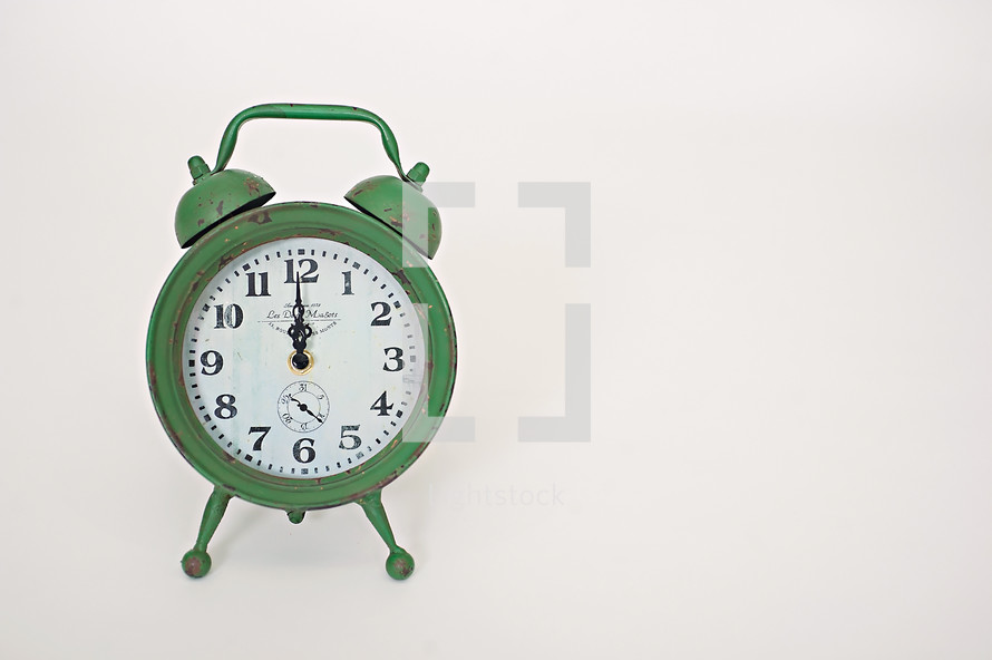 green alarm clock 