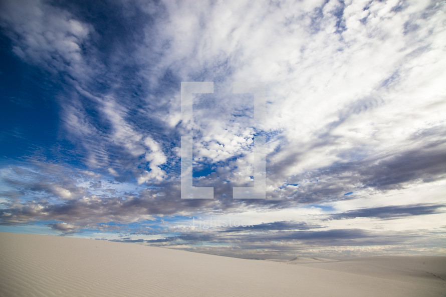vast sands and blue sky
