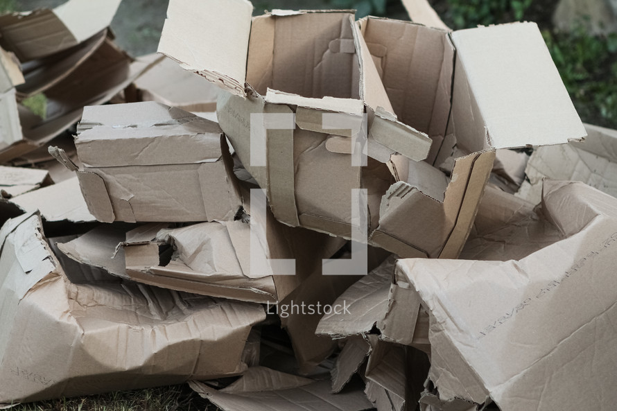 pile of ripped up cardboard boxes 