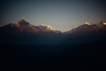 jagged snow capped mountain peaks in Nepal 