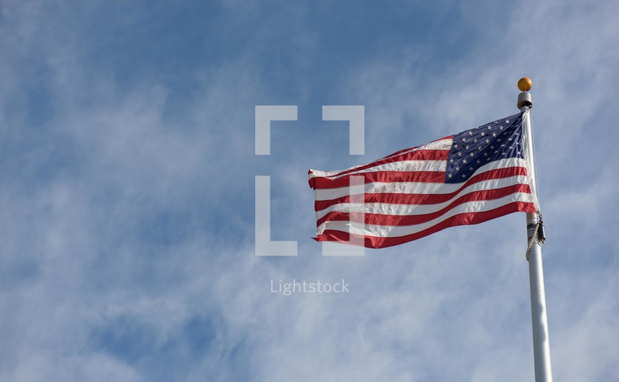 American flag waving on a flagpole 