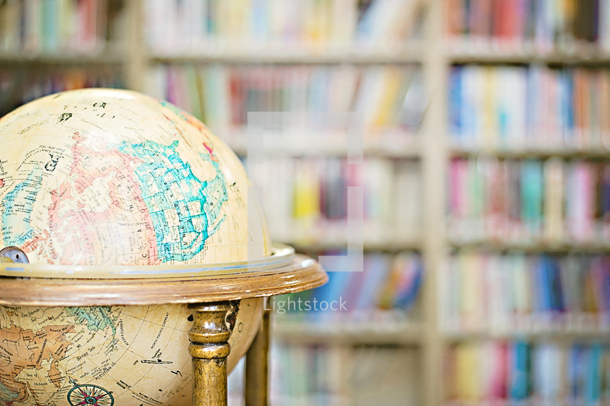 World globe in a library.