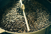 coffee beans in a roaster 