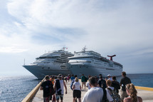 people boarding a cruise ship 