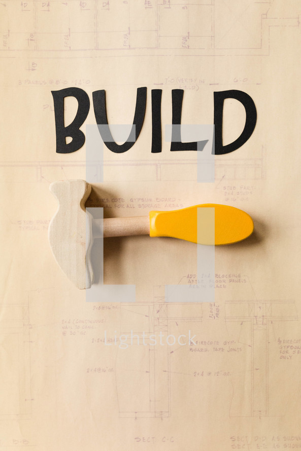 word build and a wooden hammer 