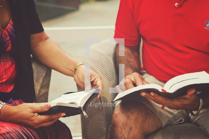 couple reading Bibles together 