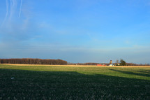 plowed field on a farm 
