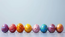 Colorful easter eggs on a white background with copy space.
