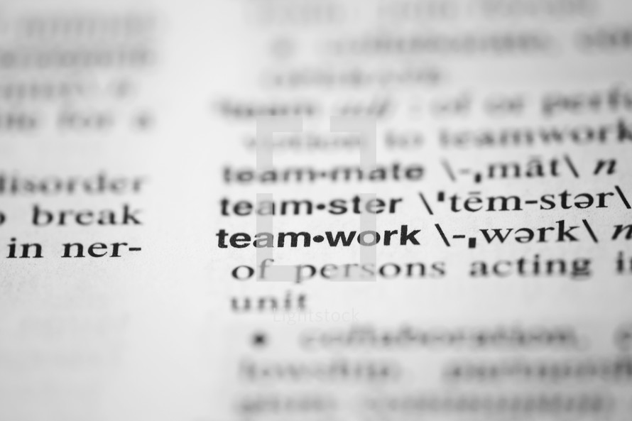 word teamwork on the pages of a dictionary 