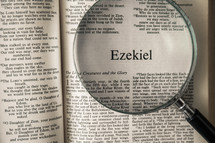 magnifying glass over Bible - Ezekiel 