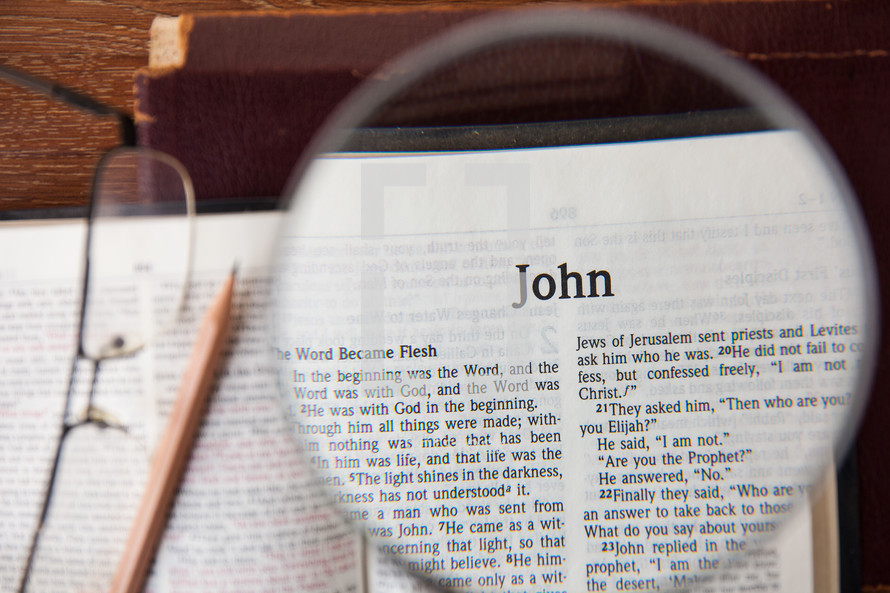 magnifying glass over John 