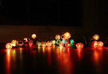 coloured Christmas lights on table