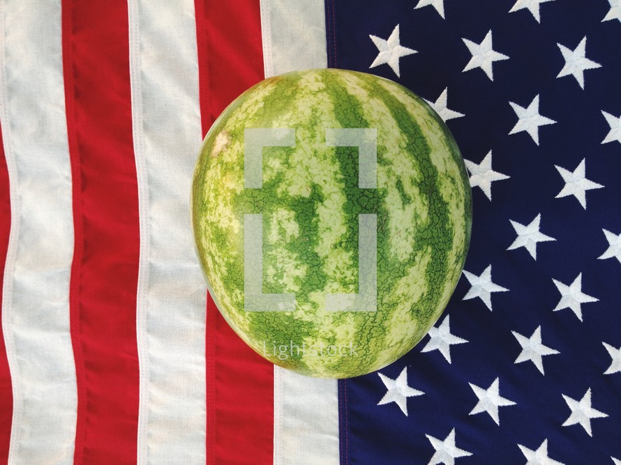 a watermelon on an American Flag 