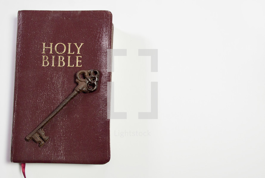 skeleton key on a the cover of a Bible 