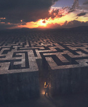 A man enters into a huge maze in the dark