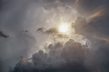 sunburst through gray clouds 