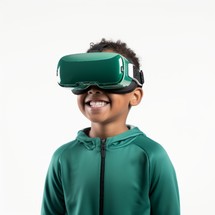Smiling 9-year-old black boy wearing a VR mask