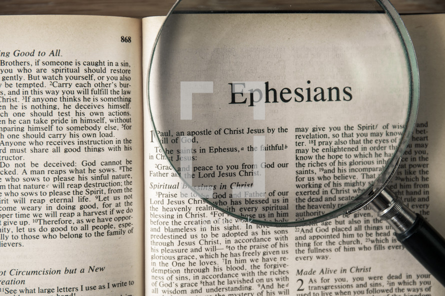 magnifying glass over Bible - Ephesians 