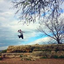 A man leaping. 