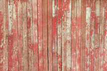 weathered red boards on a barn 