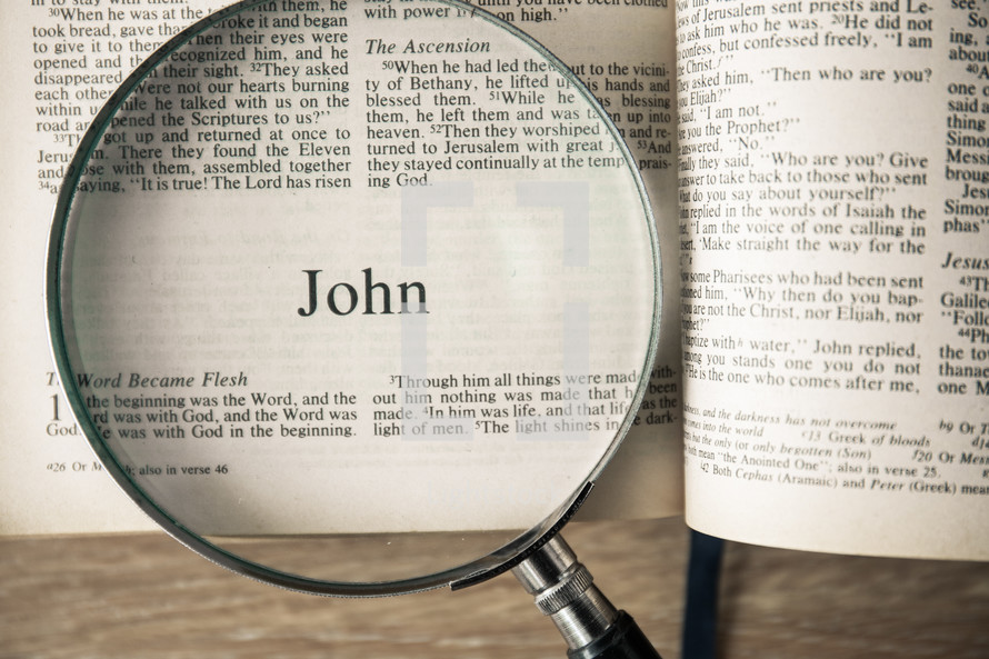 John under a magnifying glass 