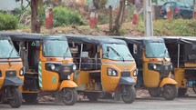 Yellow Auto rickshaw three-wheeled taxi in Vizag Visakhapatnam, India