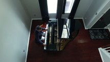 man playing a grand piano 